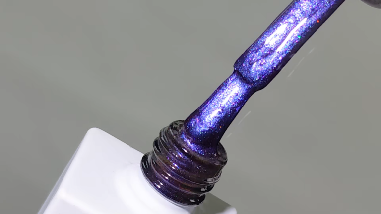 Close-up of ACOS Cat Eye Gel brush with glittery purple gel