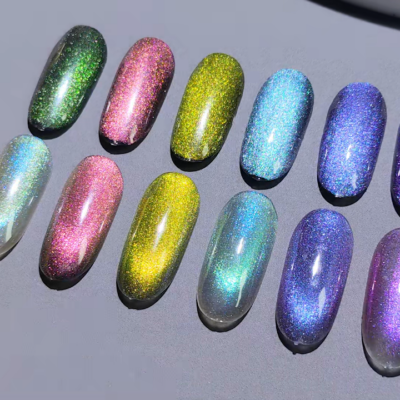 Twelve glittery cat eye gel nail polish samples in different colors on a gray background.